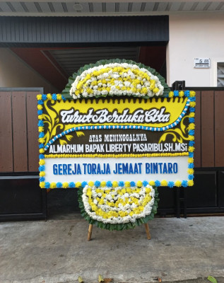 Papan Bunga Duka di Sentani